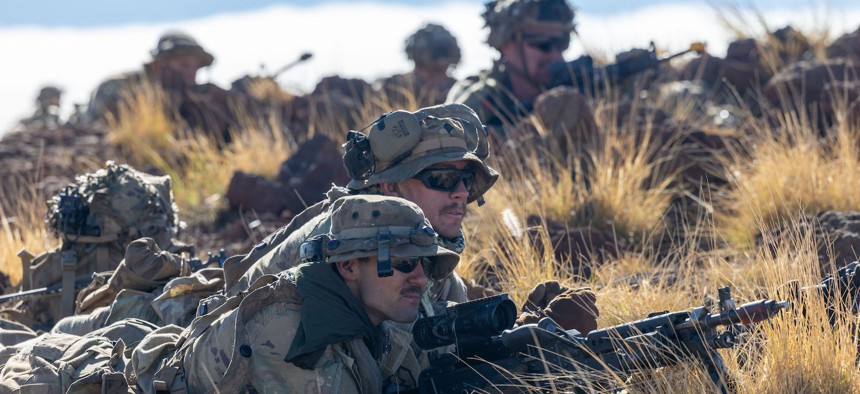 U.S. Army soldiers with Alpha Company, 2nd Battalion, 35th Infantry Regiment, 3rd Infantry Brigade Combat Team, 25th Infantry Division, fire blank rounds at an opposing force, Nov. 7, 2023, at Pohakuloa Training Area, Hawaii. 