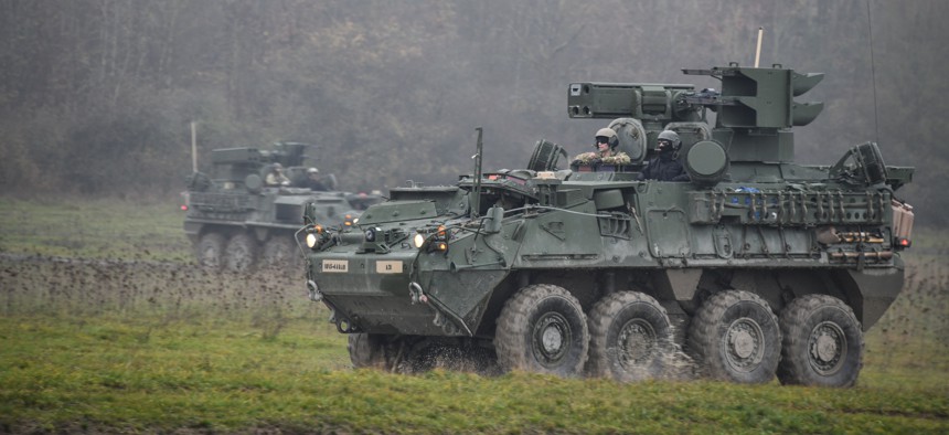 U.S. soldiers learn to drive Stryker vehicles at Oberdachstetten Training Area, Ansbach, Germany, on Nov. 29, 2022. 