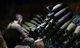 A Ukrainian soldier prepares 155mm artillery shells in his fighting position in Donetsk Oblast, Ukraine on August 6, 2023. 