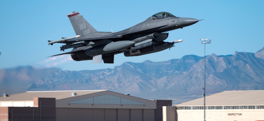 An F-16 Fighting Falcon assigned to the 16th Weapons Squadron, U.S. Air Force Weapons School, takes off for a training mission over the Nevada Test and Training Range (NTTR) from Nellis Air Force Base, Nevada, Nov. 1, 2023. 