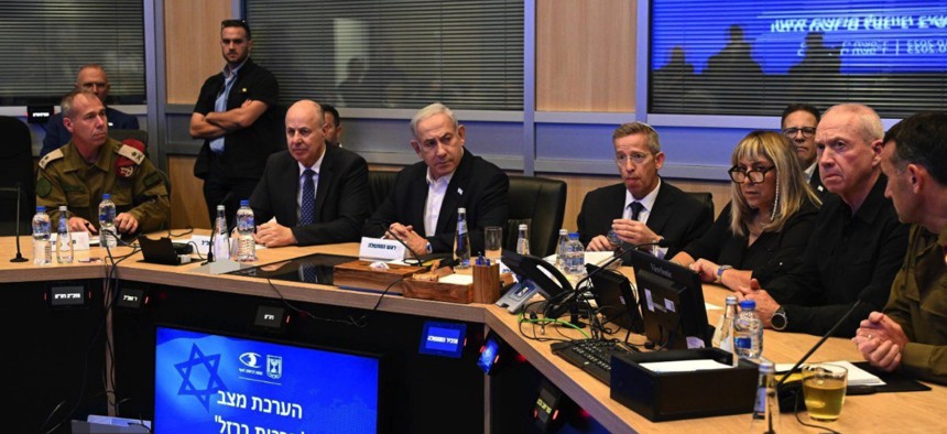 Israeli Prime Minister Benjamin Netanyahu (3rd L) holds a meeting with his security cabinet in Tel Aviv, Israel, on October 7, 2023.
