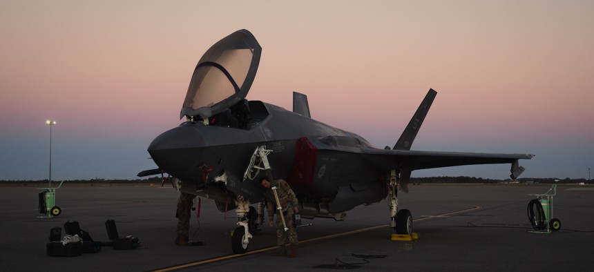 Crew chiefs assigned to the 33rd Aircraft Maintenance Squadron, Eglin Air Force Base, Florida, perform a pre-flight check for an F-35A Lightning II aircraft at MacDill Air Force Base, Florida, Feb. 13, 2023. 