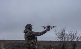 A Ukrainian soldier catches a drone after a flight during training in Donetsk Oblast, Ukraine on November 25, 2023.