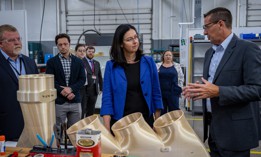 Brian Stitt, Air Force Life Cycle Management Center Rapid Sustainment Office division head, showcases production components to the Hon. Kristyn Jones, who is performing the duties of under secretary of the Air Force, at the U.S. Air Force Advanced Technology and Training Center, July 18, 2023.