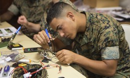 U.S. Marine Corps Lance Cpl. David N. Rodriguez assembles the Nibbler drone on Camp Lejeune, N.C., May 16, 2017.