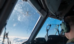 A KC-46A Pegasus flies away after refueling a C-17 Globemaster III assigned to Joint Base Charleston, South Carolina, over the coast of California during exercise Bamboo Eagle 24-1, Jan. 29, 2024.