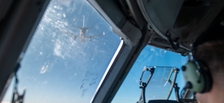 A KC-46A Pegasus flies away after refueling a C-17 Globemaster III assigned to Joint Base Charleston, South Carolina, over the coast of California during exercise Bamboo Eagle 24-1, Jan. 29, 2024.