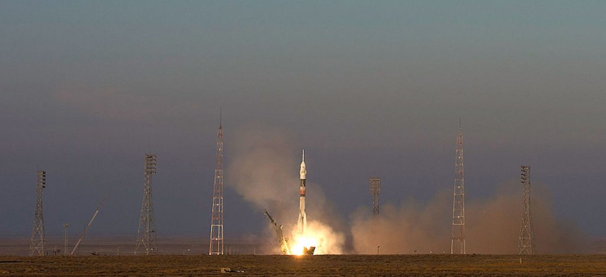 In this 2015 handout image supplied by NASA, Expedition 46-47 crewmembers ESA astronaut Tim Peake, NASA astronaut Tim Kopra and commander Yuri Malenchenko launch into space from Baikonur cosmodrome.