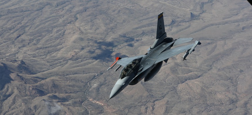 An F-16 assigned to Morris Air National Guard Base in Arizona breaks off after midair refueling. 