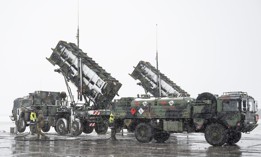 Two trailers with Patriot air defense system launchers at a refueling facility in southeastern Poland in 2023. 