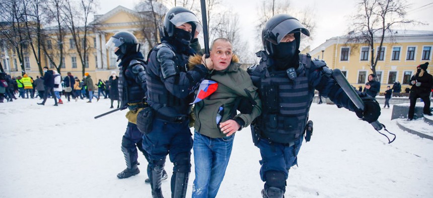 SAINT-PETERSBURG, RUSSIA - 2021/01/31: Police officers detain a protester during the demonstration. Protest against the detention of the opposition leader Alexey Navalny in St. Petersburg. 