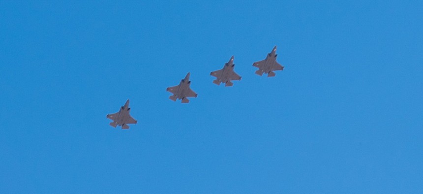 U.S. Air Force F-35A Lightning IIs assigned to the 421st Expeditionary Fighter Squadron fly in a formation in the U.S. Central Command area of responsibility July 25, 2023.