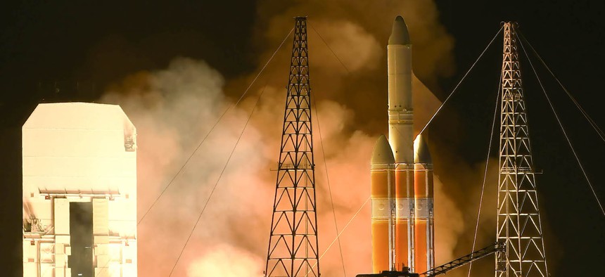 In this 2023 photo, a United Launch Alliance Delta IV Heavy rocket lifts off from Cape Canaveral Space Force Station carrying a classified spy satellite for the National Reconnaissance Office.