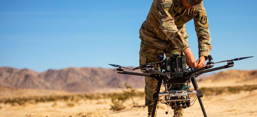 Army Capt. Eric Tatum, assigned to the Army Futures Command's Artificial Intelligence Integration Center, conducts field testing with the Inspired Flight 3 Drone during Project Convergence at Fort Irwin, Calif., Oct. 27, 2022.