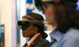 In this 2019 photo, attendees participate in an Augmented Reality demonstration hosted by Raytheon during the 35th Space Symposium in Colorado Springs, Colorado.