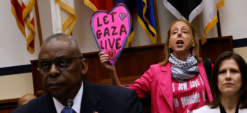 Code Pink for Peace activist Medea Benjamin interrupts Defense Secretary Lloyd Austin as he testifies to the House Armed Services Committee on Capitol Hill on April 30, 2024.