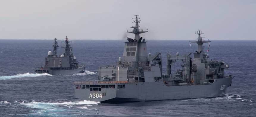  Supply-class replenishment oiler HMAS Stalwart (A304) from the Royal Australian Navy and Asagiri-class destroyer JS Yugiri (DD 153) from the Japan Maritime Self-Defense Force sail during Annual Exercise 2023.