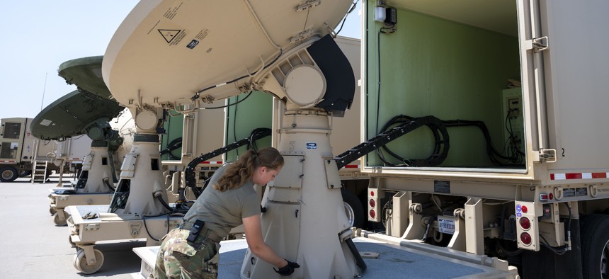 U.S. Air Force Staff Sgt. Rhyan Acey performs maintenance on the AN-TSQ-180 Milstar Communications Vehicle July 28, 2021, at the 233rd Space Group, Greeley Air National Guard Station, Greeley, Colorado.