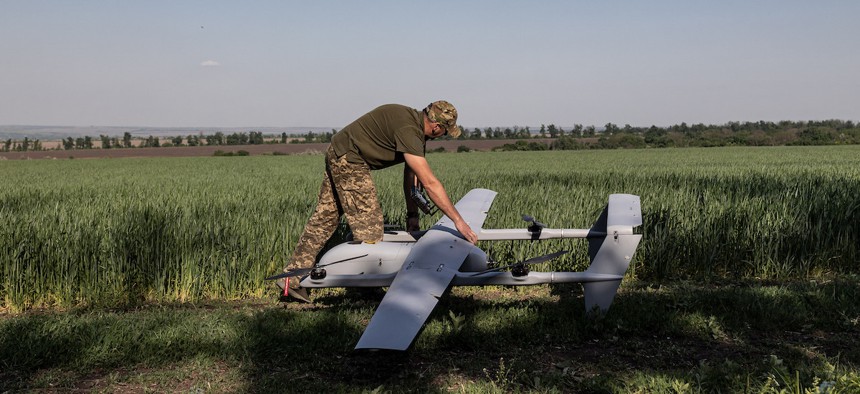 A Ukrainian soldier prepares a drone during training in Donetsk Oblast, Ukraine, May 3, 2024. 