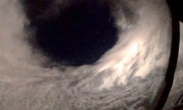 Lightning inside the eye of Hurricane Lee illuminates the flight of the Air Force Reserve's 53rd Weather Reconnaissance Squadron, known as Hurricane Hunters, Sept. 7, 2023, over the Atlantic Ocean.