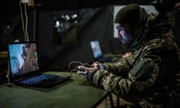 A recruit of the 1st Separate Mechanized Battalion trains and learns to work with FPV strike drones while undergoing five-day training at a military outdoor firing range on March 12, 2024 in central Ukraine. 
