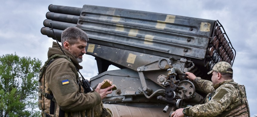 Ukrainian servicemen of 65th Separate Mechanized brigade operate a BM-21 "Grad" multiple rocket launcher to fire toward Russian positions near the frontline in Zaporizhzhia region. 