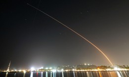 A SpaceX Falcon 9 rocket launches with 20 Starlink satellites to low-Earth orbit from Vandenberg Space Force Base as the International Space Station (ISS) intersects the flight path on May 9, 2024, in Lompoc, California.