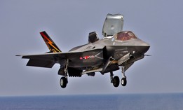 A 2013 photo shows an F-35B coming in for a ship landing during the program's Developmental Testing Phase II.