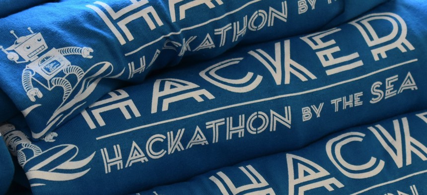 T-shirts from a 2021 hackathon run by the Naval Facilities Engineering and Expeditionary Warfare Center and the Ventura County (Calif.) Office of Education. 