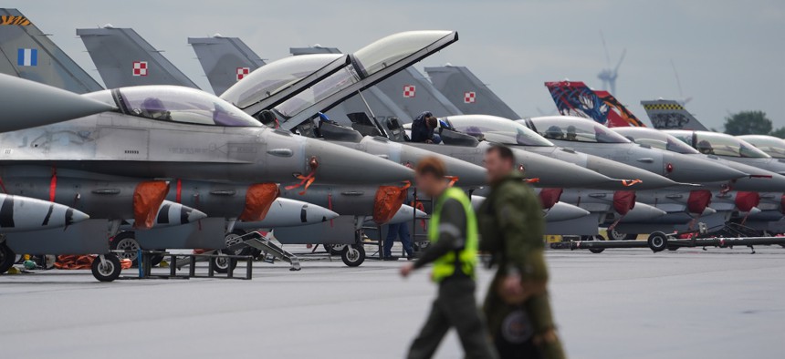 Fighter jets are lined up on the airfield during the NATO air force maneuver "Tiger Meet" on the grounds of the Tactical Air Force Wing 51 "Immelmann," June 11, 2024. 