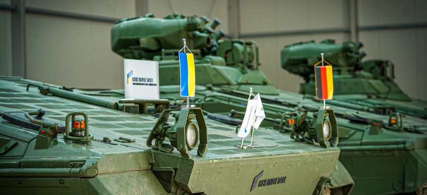 Marder infantry fighting vehicles sit at the new Rheinmetall Ukrainian Defense Industry LLC repair facility in western Ukraine.