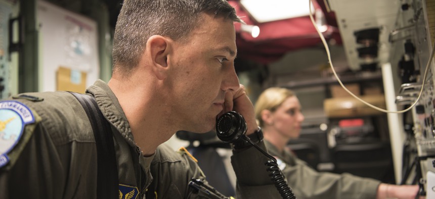 A 490th Missile Squadron missile combat crew commander discusses ICBM test launch procedures in a Launch Control Center at Vandenberg Air Force Base, Calif., on  Feb. 3, 2020.