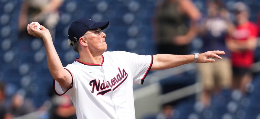 Outgoing NATO Secretary-General Jens Stoltenberg throws out the first pitch before a baseball game between the Washington Nationals and the St. Louis Cardinals at Nationals Park on July 8, 2024, in Washington, DC. 