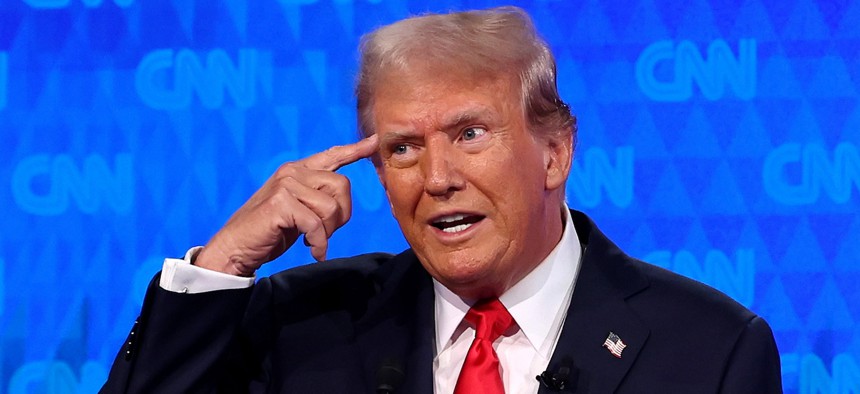 Republican presidential candidate, former U.S. President Donald Trump participates in the CNN Presidential Debate at the CNN Studios on June 27, 2024 in Atlanta, Georgia