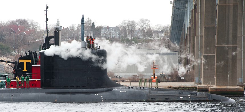 In this 2022 photo, the future USS Oregon (SSN 793) makes its way under the Gold Star Bridge after departing General Dynamics Electric Boat on Tuesday, March 1, 2022 enroute to Submarine Base New London.