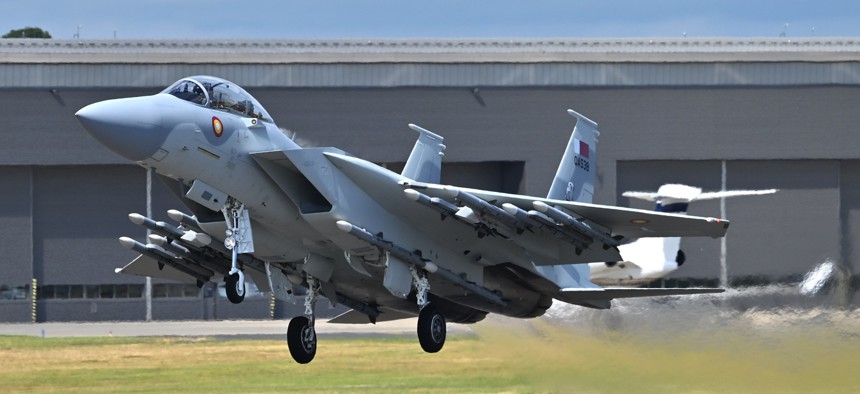 A Boeing F-15 performs during the Farnborough International Airshow on July 22, 2024, in Farnborough, England.