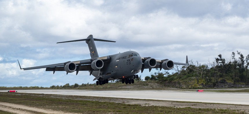 A U.S. Air Force C-17 Globemaster III assigned to the 6th Airlift Squadron (AS) lands at an auxiliary field near Anderson Air Force Base, Guam in support of Valiant Shield 2024 June 11, 2024. 