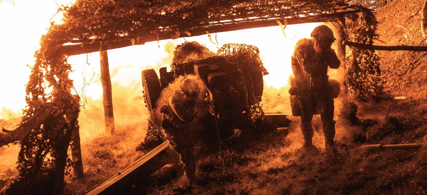 Ukrainian soldiers fire D-30 artillery in the direction of Toretsk, Ukraine, on July 30, 2024.