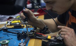 An employee of HentaiFPV Drones builds a first-person-view drone for military use at a factory in Lviv, Ukraine, on February 26, 2024.