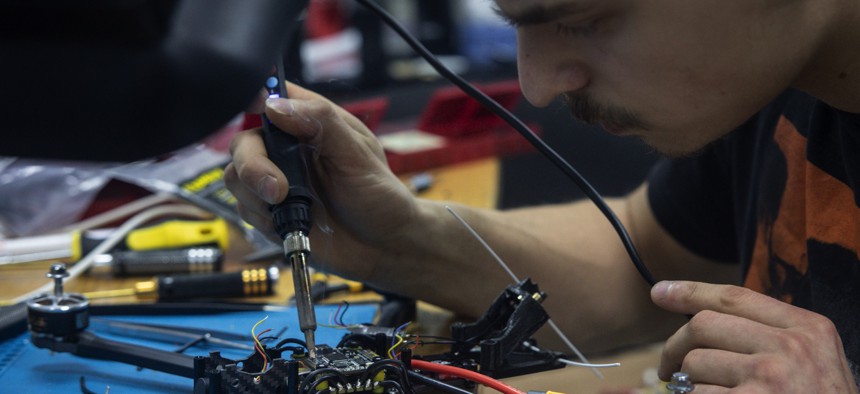 An employee of HentaiFPV Drones builds a first-person-view drone for military use at a factory in Lviv, Ukraine, on February 26, 2024.