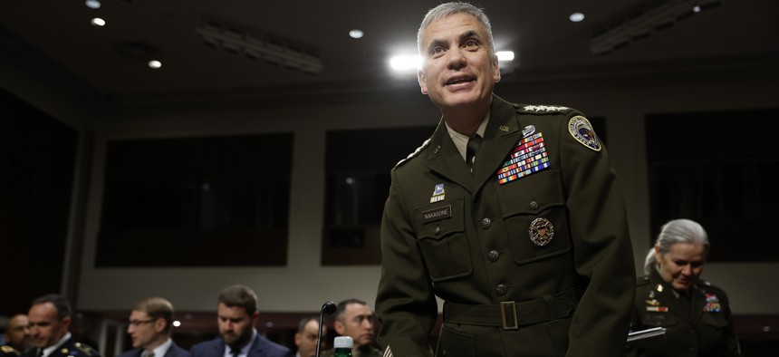 Paul Nakasone, who was then the commander of U.S. Cyber Command and director of the National Security Agency, arrives to testify before the Senate Armed Services Committee in the Dirksen Senate Office Building on Capitol Hill. 