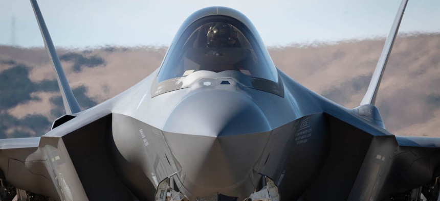 A pilot from the 34th Fighter Squadron conducts pre-flight preparations in the cockpit of an F-35A Lighting II on the tarmac at Santa Maria Airport, Calif., during Bamboo Eagle 24-3.