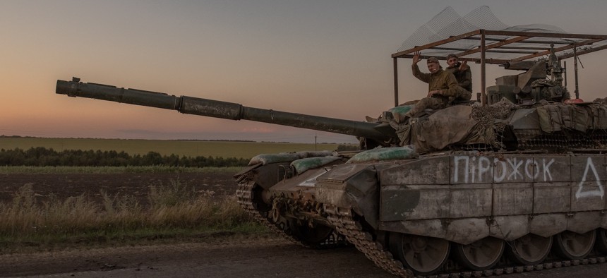 Ukrainian servicemen operate a tank on a road near the border with Russia, in the Sumy region of Ukraine, on August 14, 2024. 