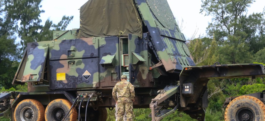 In this 2017 photo, a U.S. Soldier with 1st Battalion, 1st Air Defense Artillery Regiment, performs a routine inspection of a patriot radar system during a training exercise on Kadena Air Base in Japan.