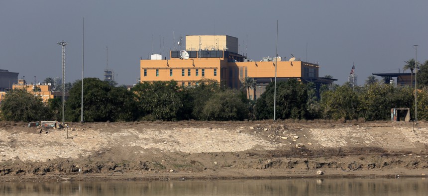 U.S. Embassy building in Baghdad. As part of an ongoing national emergency in Iraq, OPM officials said civilian employees can apply to waive caps on their premium pay levels through Dec. 31. 