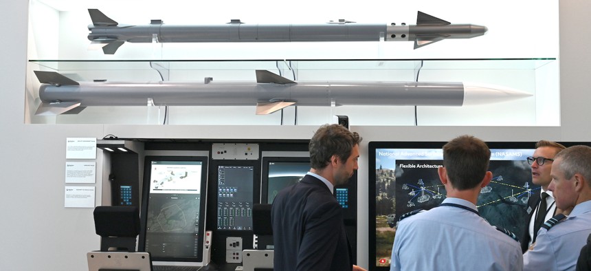 An AIM-9X Sidewinder Missile, AMRAAM missile and a NASAMS Air Defense System on display at the Raytheon Technologies Corporation RTX exhibition during the Farnborough International Airshow 2024, on July 23, 2024 in Farnborough, England. 