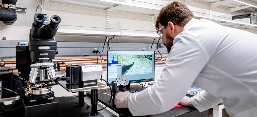 A researcher at work in Argonne's Quantum Foundry, which develops standardized materials for quantum computing development.