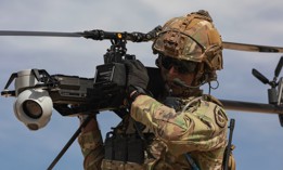 A U.S. soldier carries an Anduril Ghost X.