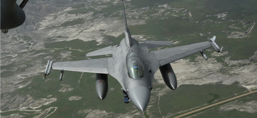 A U.S. Air Force F-16 Falcon from the South Dakota Air National Guard’s 114th Fighter Wing flying over the South Dakota Badlands on June 27, 2023.