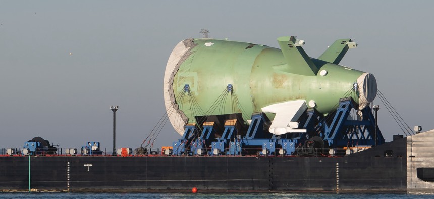 The stern section of the first Columbia-class ballistic missile submarine travels by barge from HII’s Newport News Shipbuilding division in Virginia to General Dynamics Electric Boat in Connecticut in January 2024.